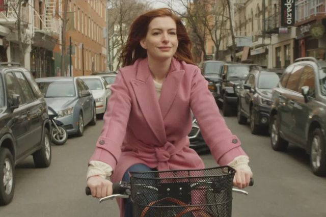 Anne Hathaway on a bike